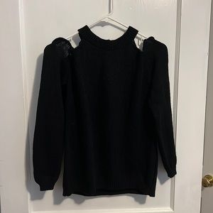 Black sweater, shoulder cut outs. Size “one size fits most”